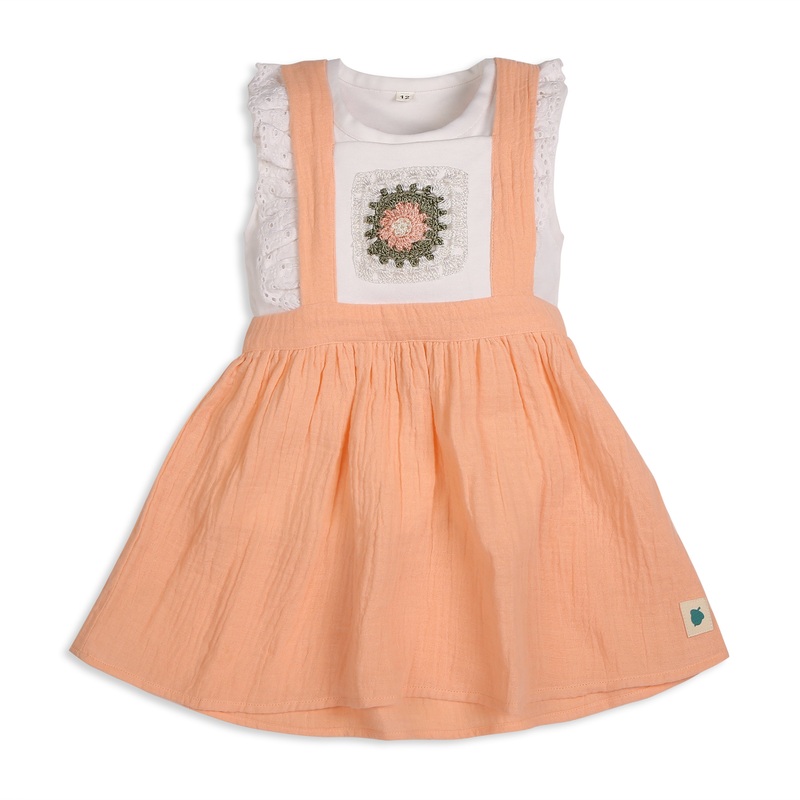 My Milestones Peony Handcrafted Crochet Detail Dungaree Dress in Double Cloth with Bio-Wash Ruffle Detail Tee – Peach